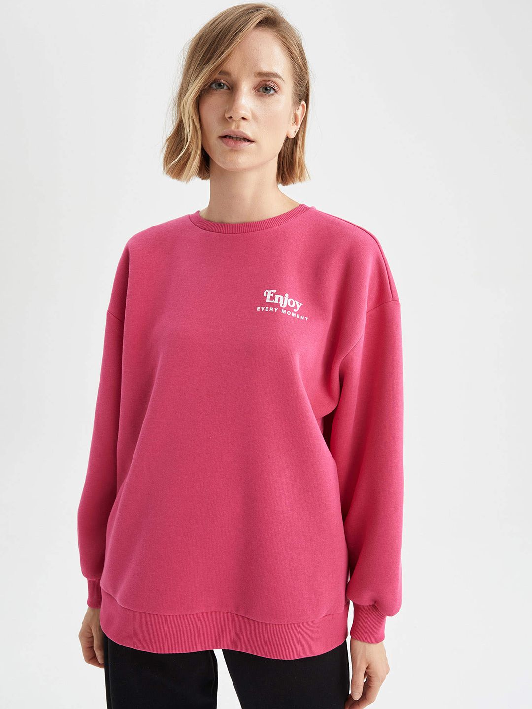 DeFacto Women Pink Solid Sweatshirt Price in India