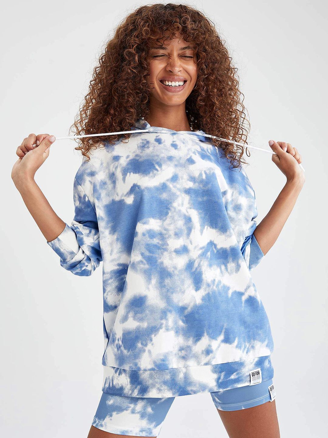 DeFacto Women Blue & White Dyed Printed Hooded Sweatshirt Price in India