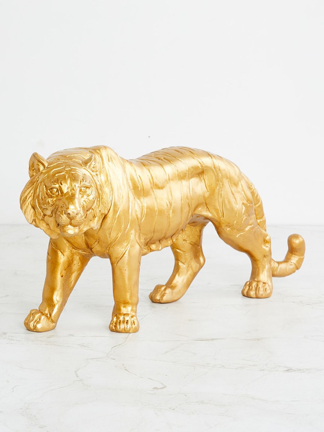 Home Centre Gold Polyresin Walking Tiger Figurine Price in India