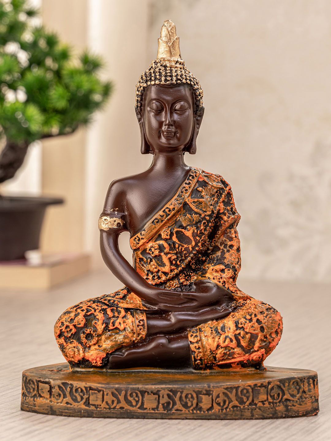 TIED RIBBONS Orange & Brown Decorative Meditating Lord Buddha Idol Figurine Showpiece Price in India