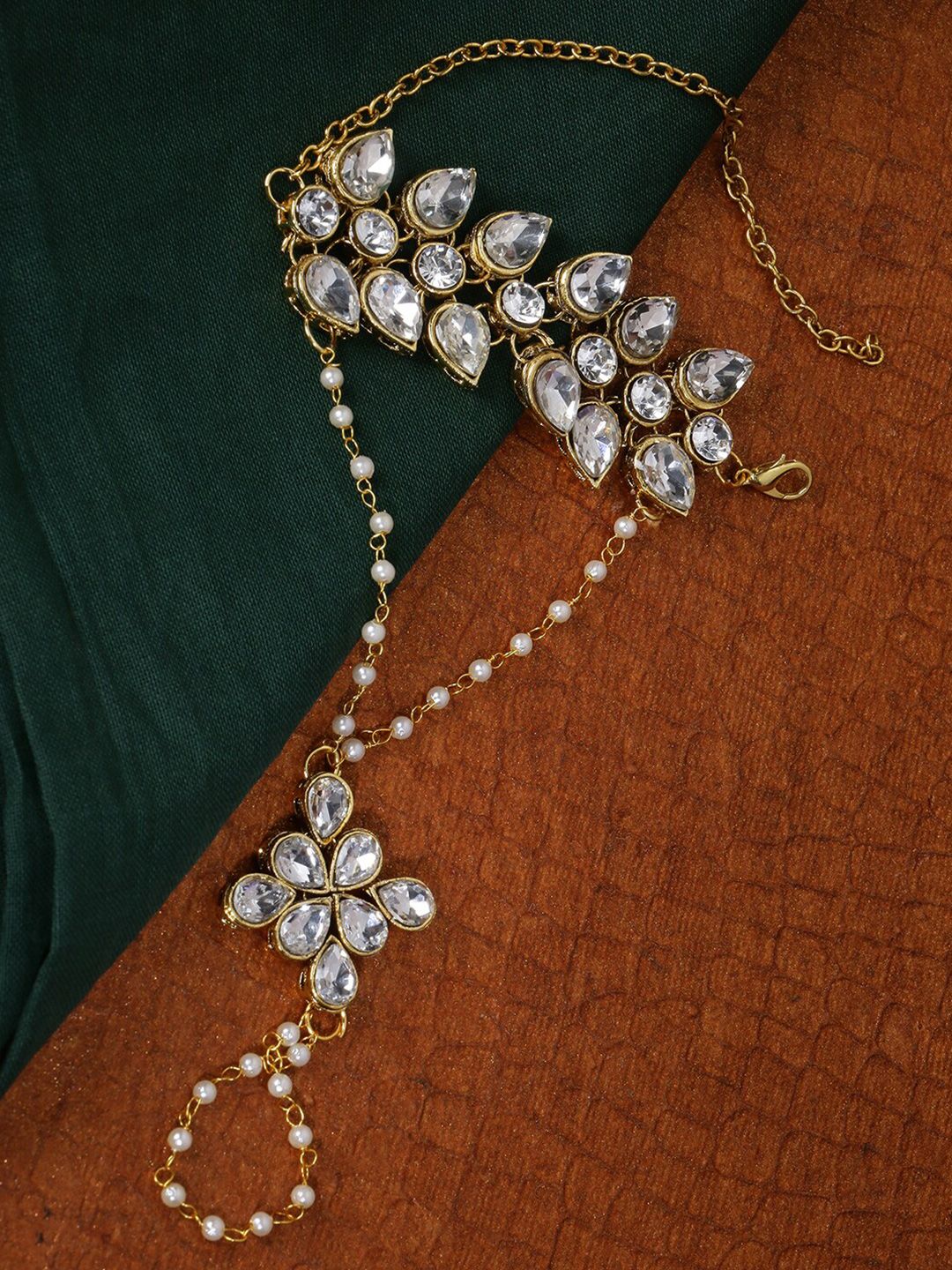 LIVE EVIL Women Gold-Toned & White Kundan Gold-Plated Ring Bracelet Price in India