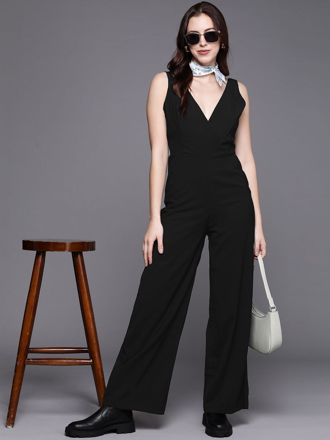 JC Mode Black Solid V-Neck Basic Jumpsuit Price in India