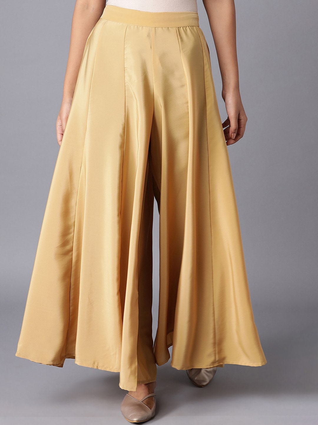 W Women Gold-Toned Flared Pleated Parallel Trousers Price in India