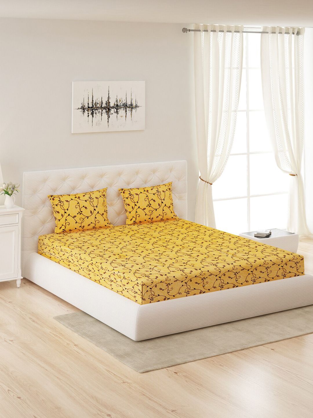 Monte Carlo Yellow Printed 300 GSM Queen Bedsheet with 2 Pillow Cover Price in India