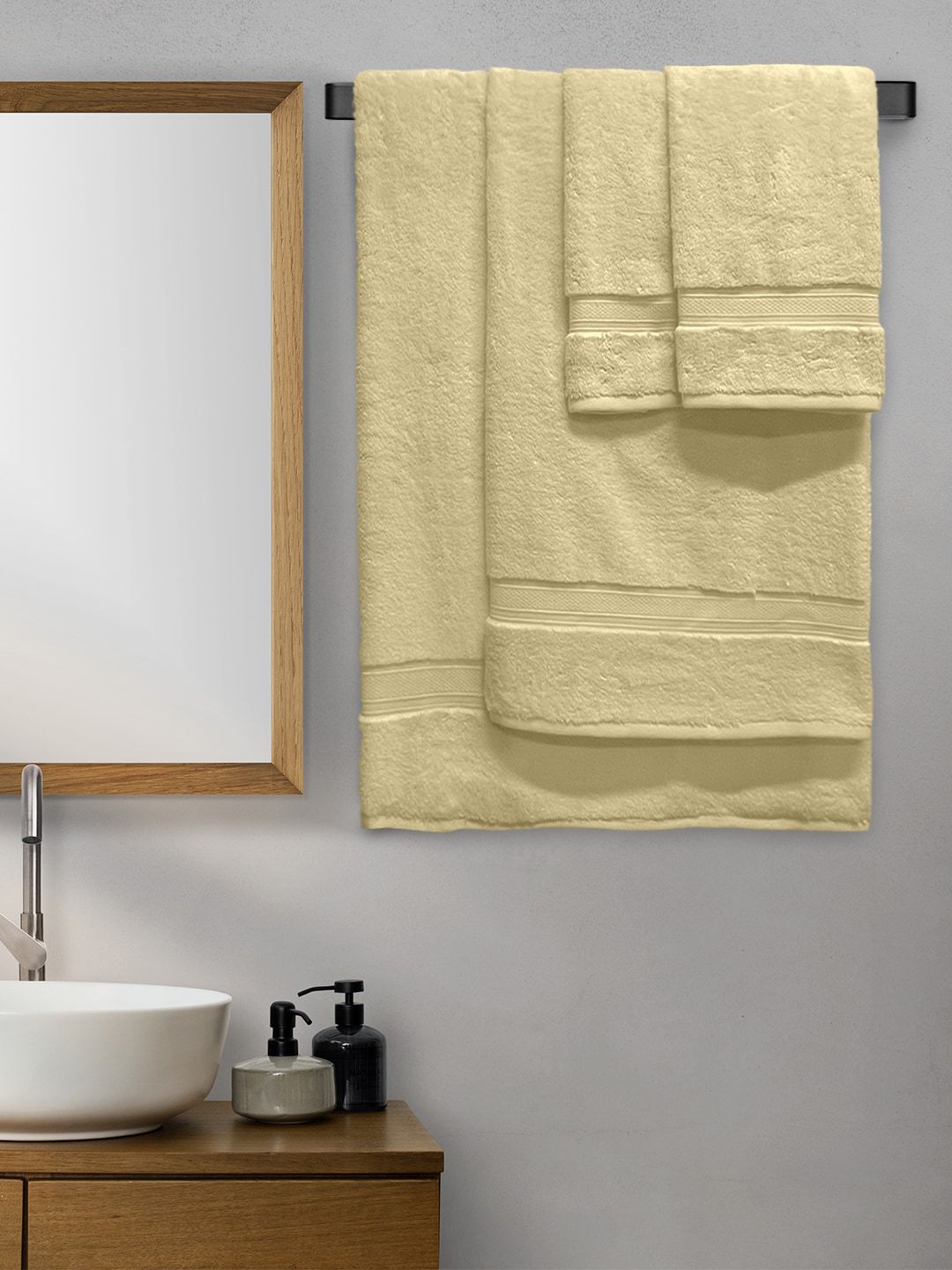 Aura Set Of 4 Yellow Solid 600 GSM Cotton Towel Set Price in India