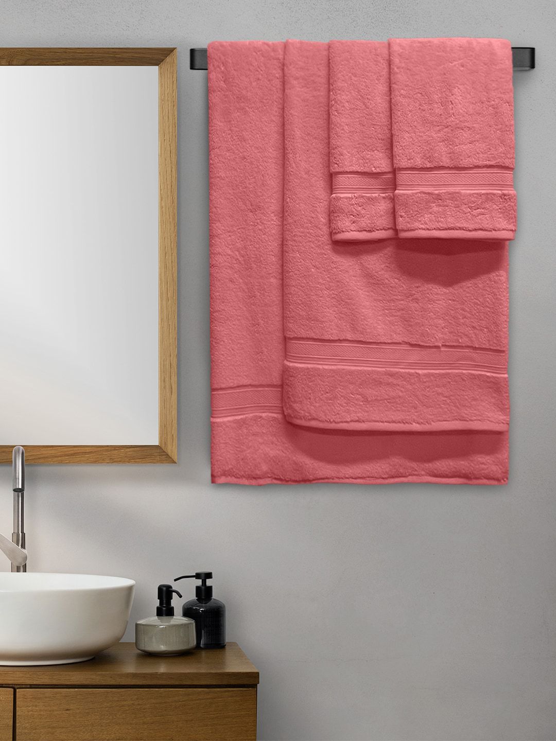 Aura Set Of 4 Coral Coloured Solid 600 GSM Cotton Towel Set Price in India