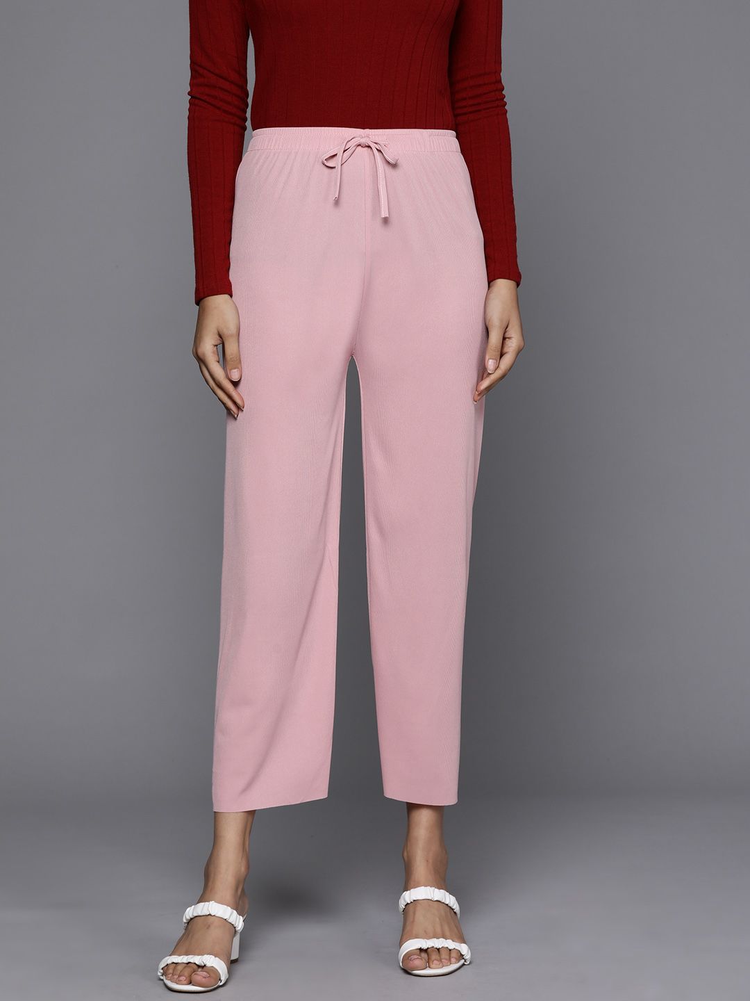 JC Mode Women Pink Solid Trousers Price in India