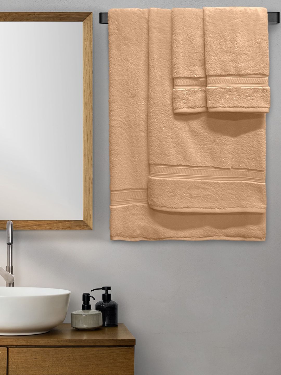 Aura Set of 4 Peach-Coloured Solid 600 GSM Cotton Towels Price in India
