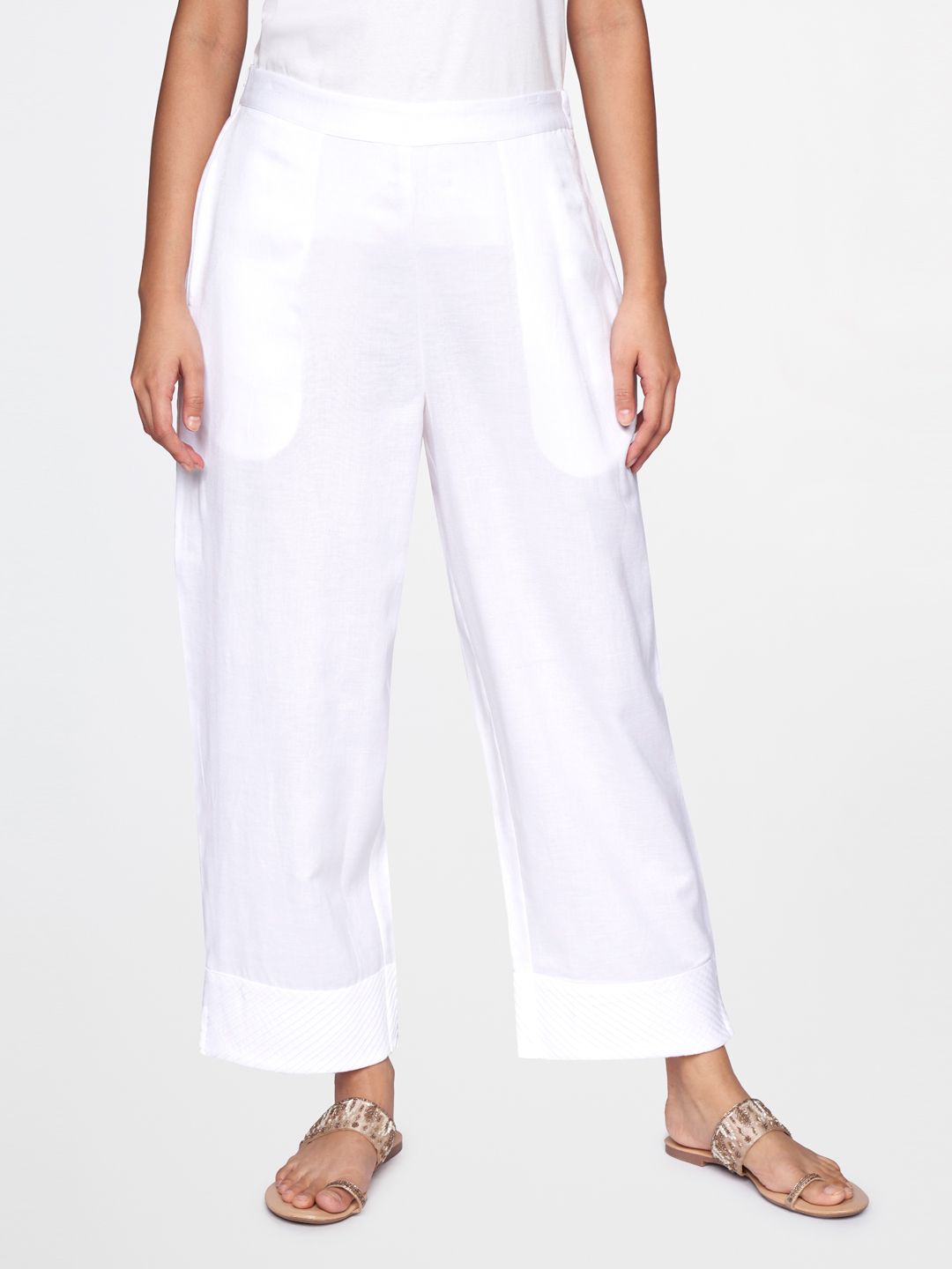 Global Desi Women White Solid Tapered Fit Trousers Price in India