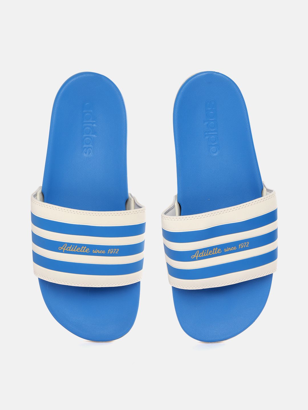 ADIDAS Unisex Off White & Blue Striped Adilette Comfort Sliders Price in India