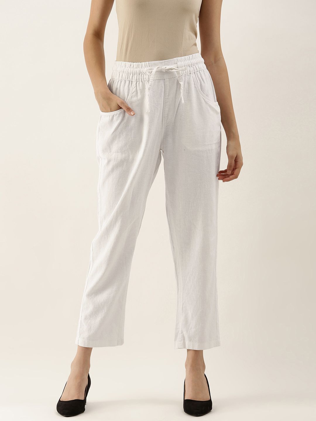 AND Women White Solid Straight Fit Trousers Price in India