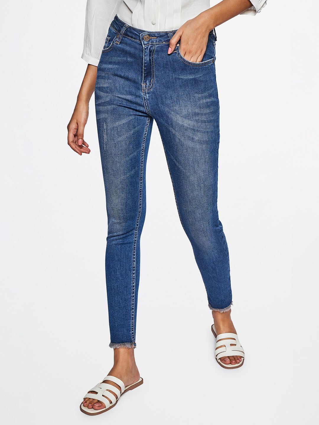 AND Women Blue Skinny Fit Light Fade Stretchable Jeans Price in India