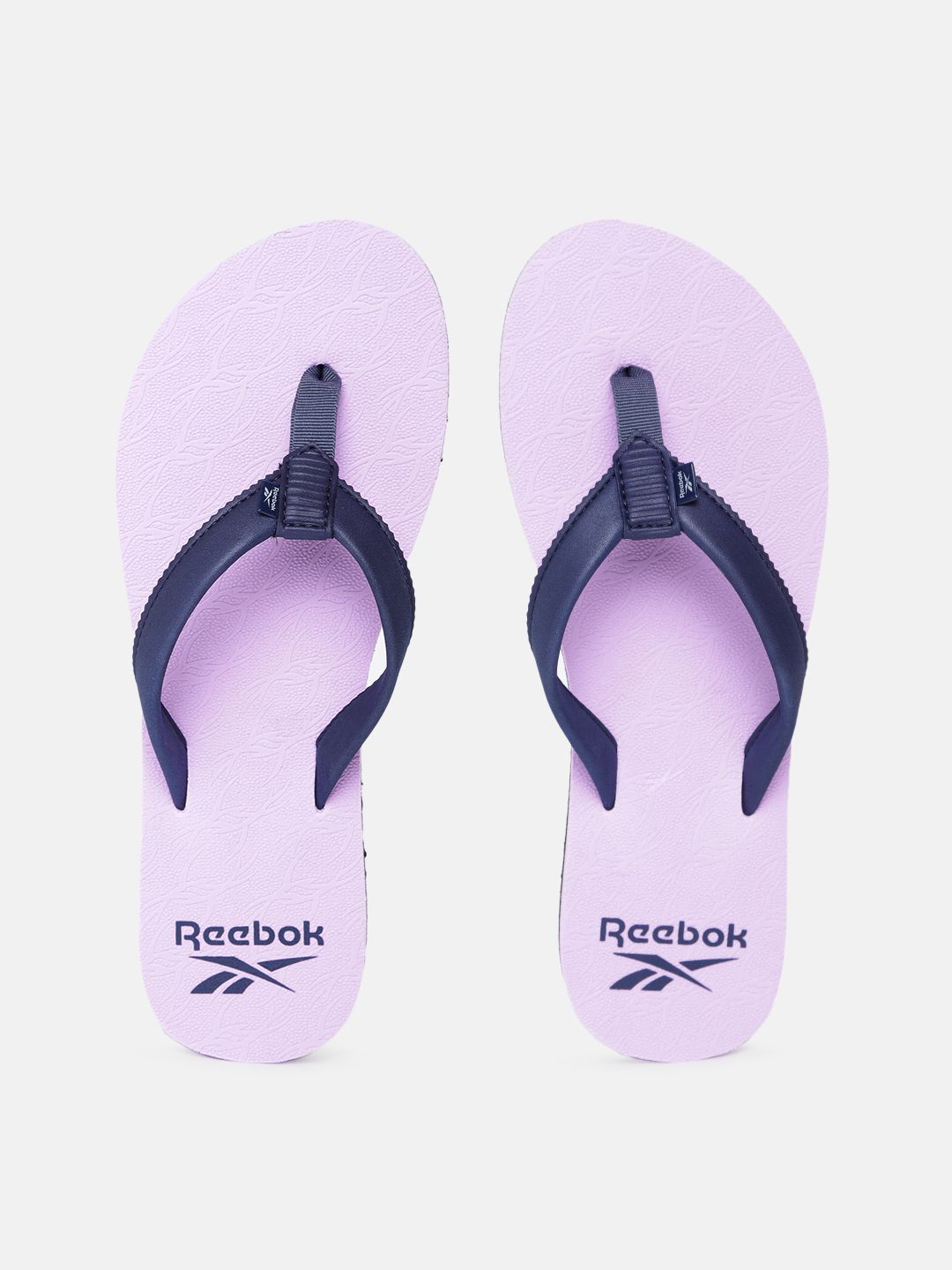 Reebok Women Navy Blue & Lavender Solid Thong Flip-Flops Price in India