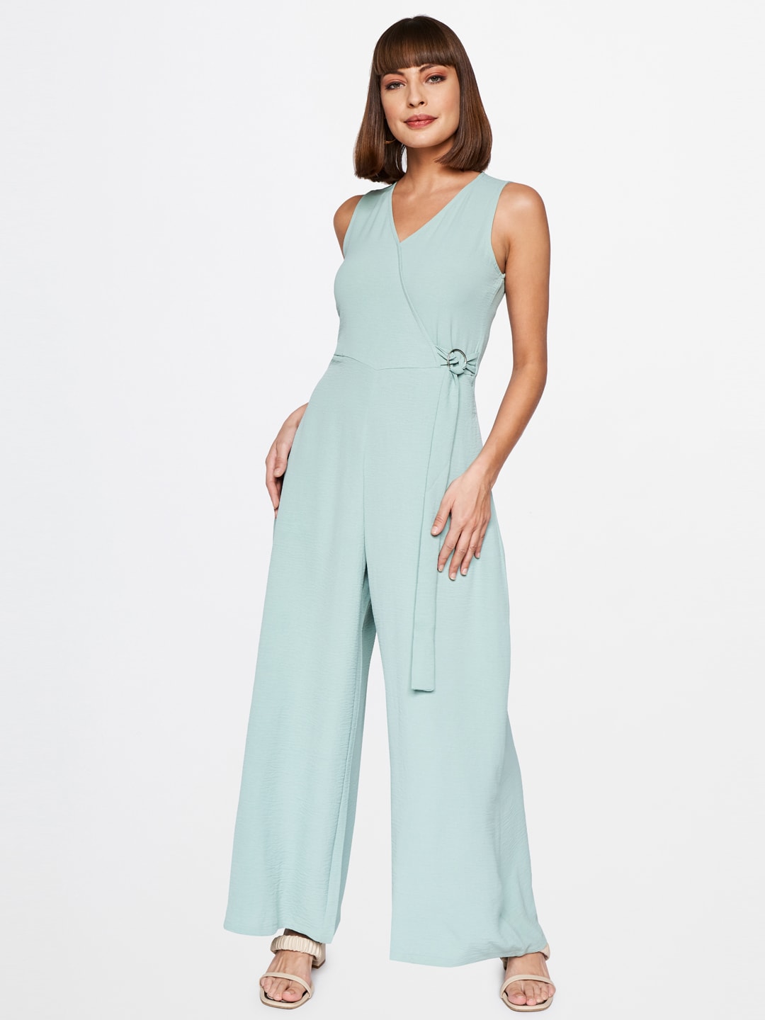 AND Women Green Solid Jumpsuit Price in India