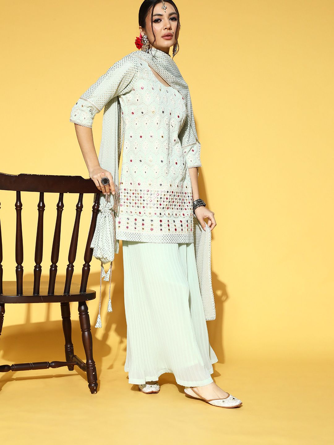 Libas Floral Poly-Georgette Short Kurti & Flared Pants with Potli Bag Price in India