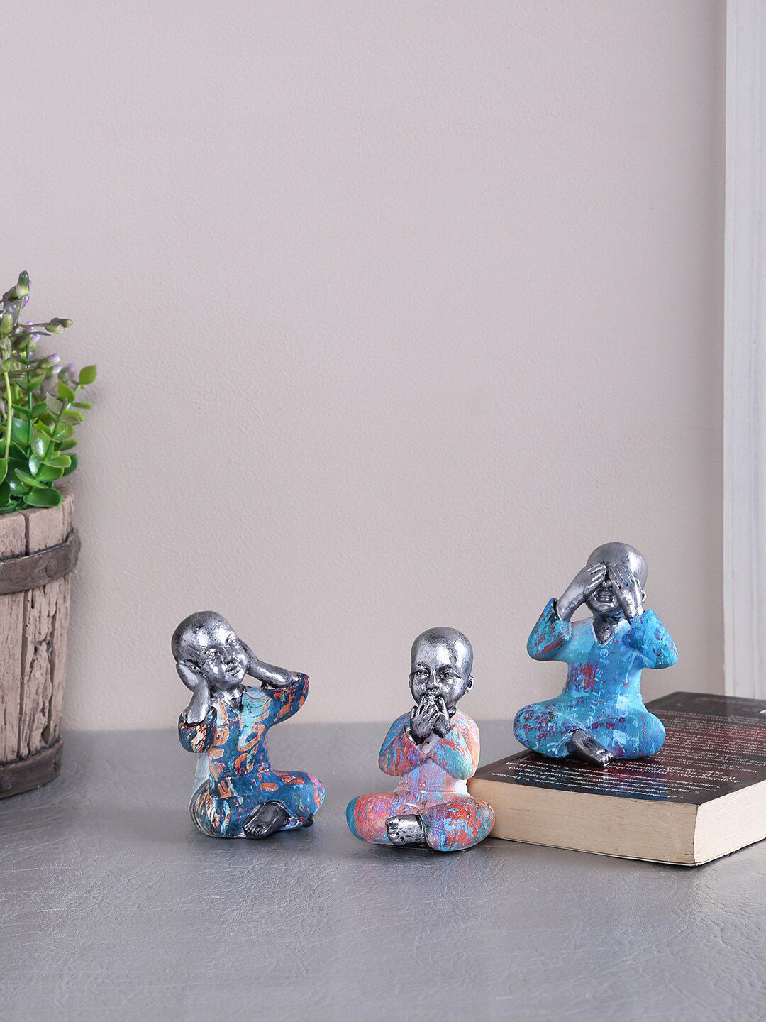 TAYHAA Set Of 3 Silver-Toned & Blue Buddha's Impressions Showpieces Price in India