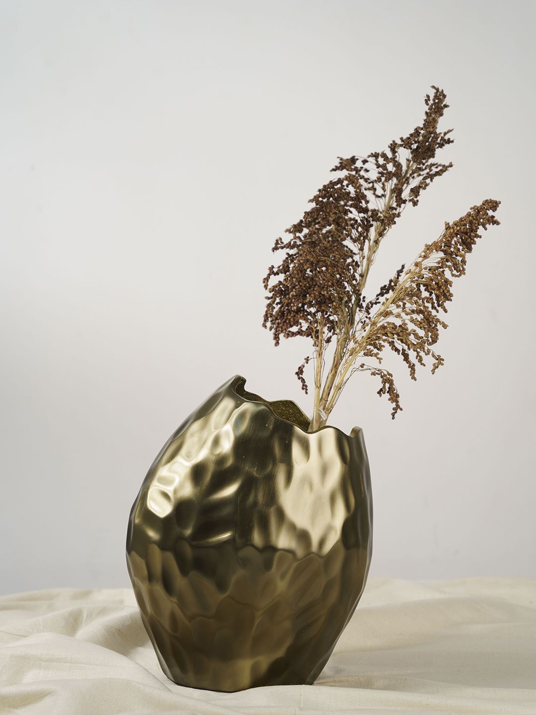 Folkstorys Gold-Toned Textured Hammered Metal Vase Price in India