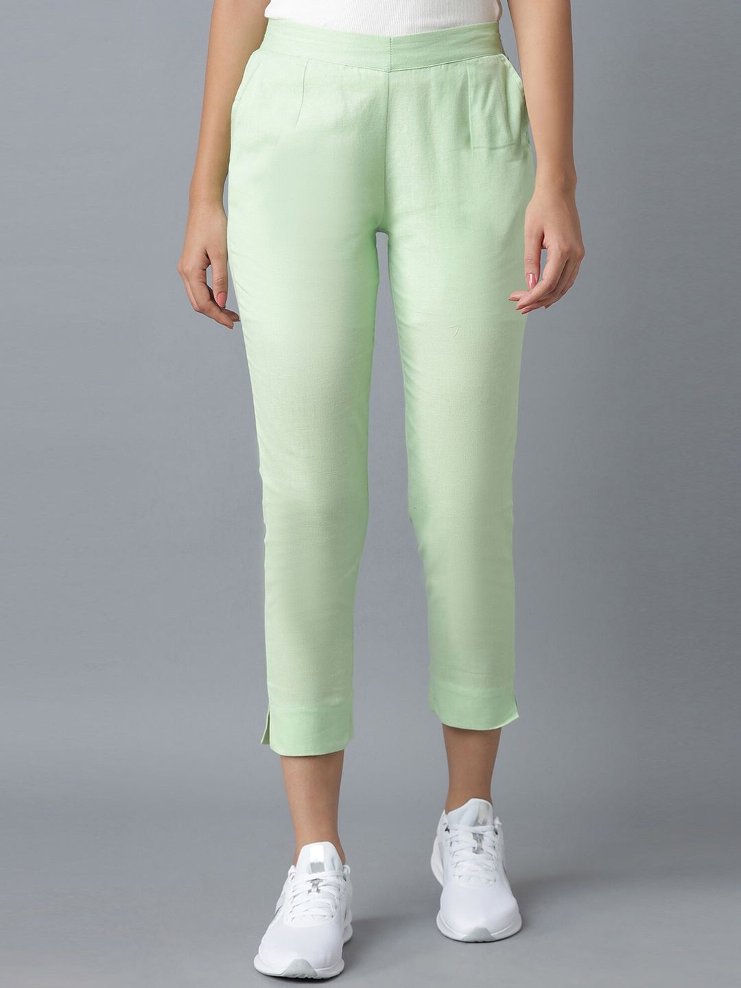 elleven Women Green Tapered Fit Pleated Cigarette Trousers Price in India