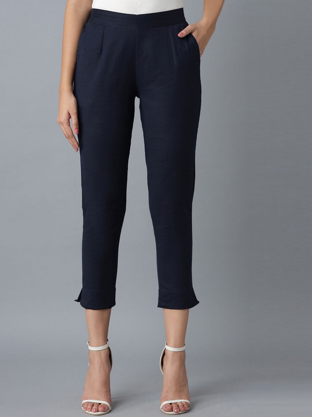 elleven Women Navy Blue Tapered Fit Pleated Cigarette Trousers Price in India