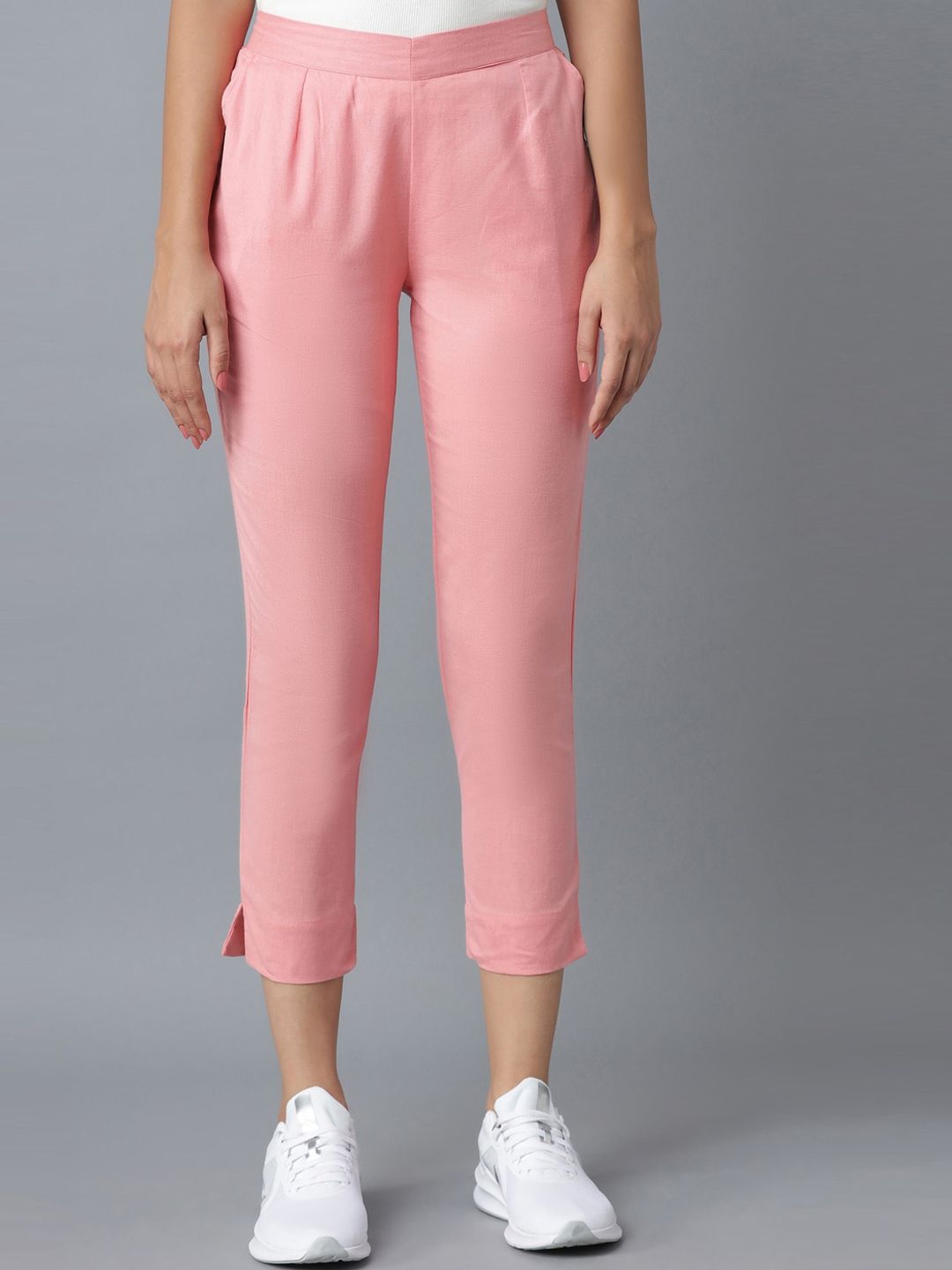 elleven Women Pink Solid Tapered Fit Pleated Trousers Price in India