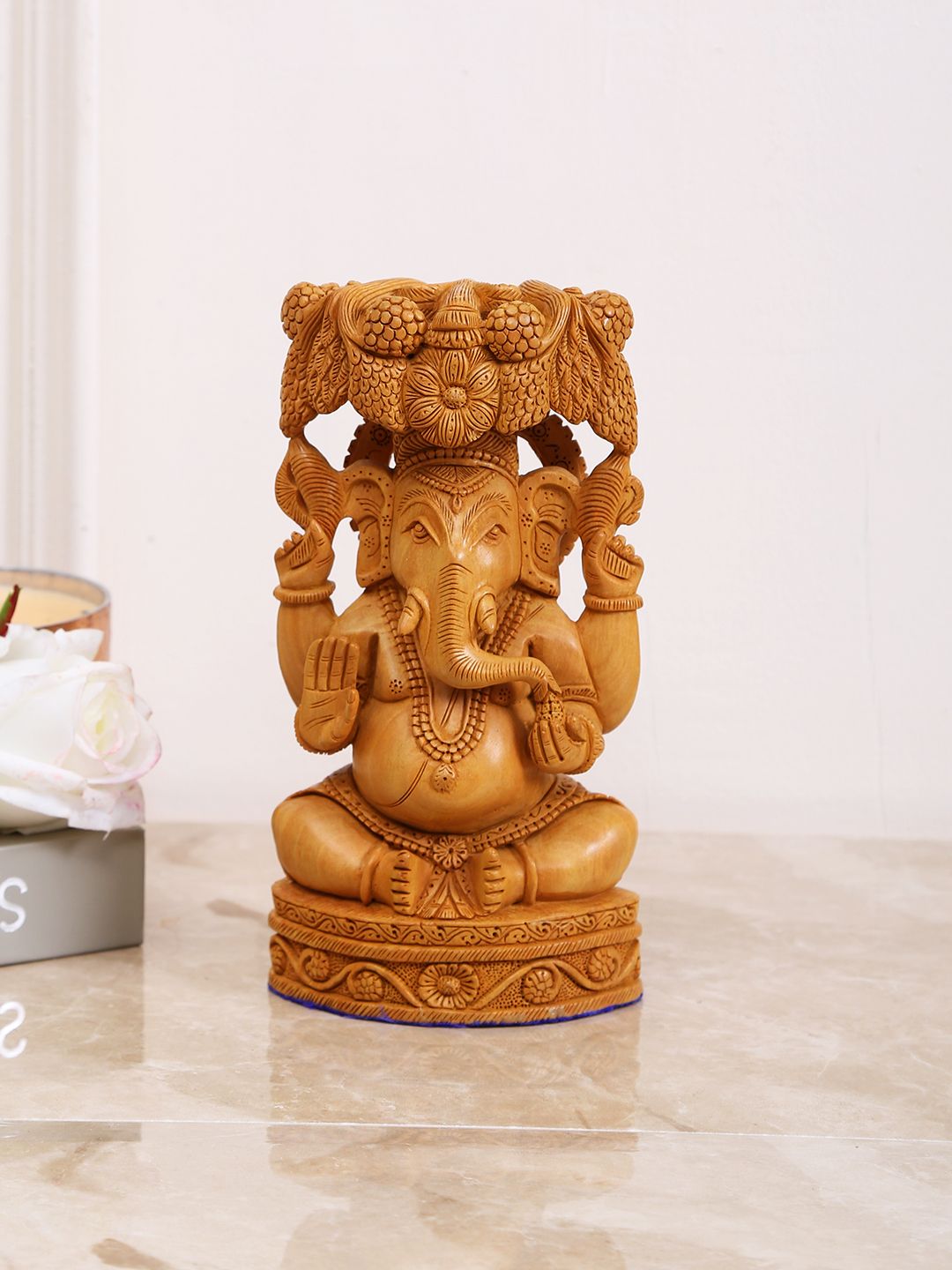 Aapno Rajasthan Brown Pleasingly Carved Wooden Ganesh Idol Showpiece Price in India