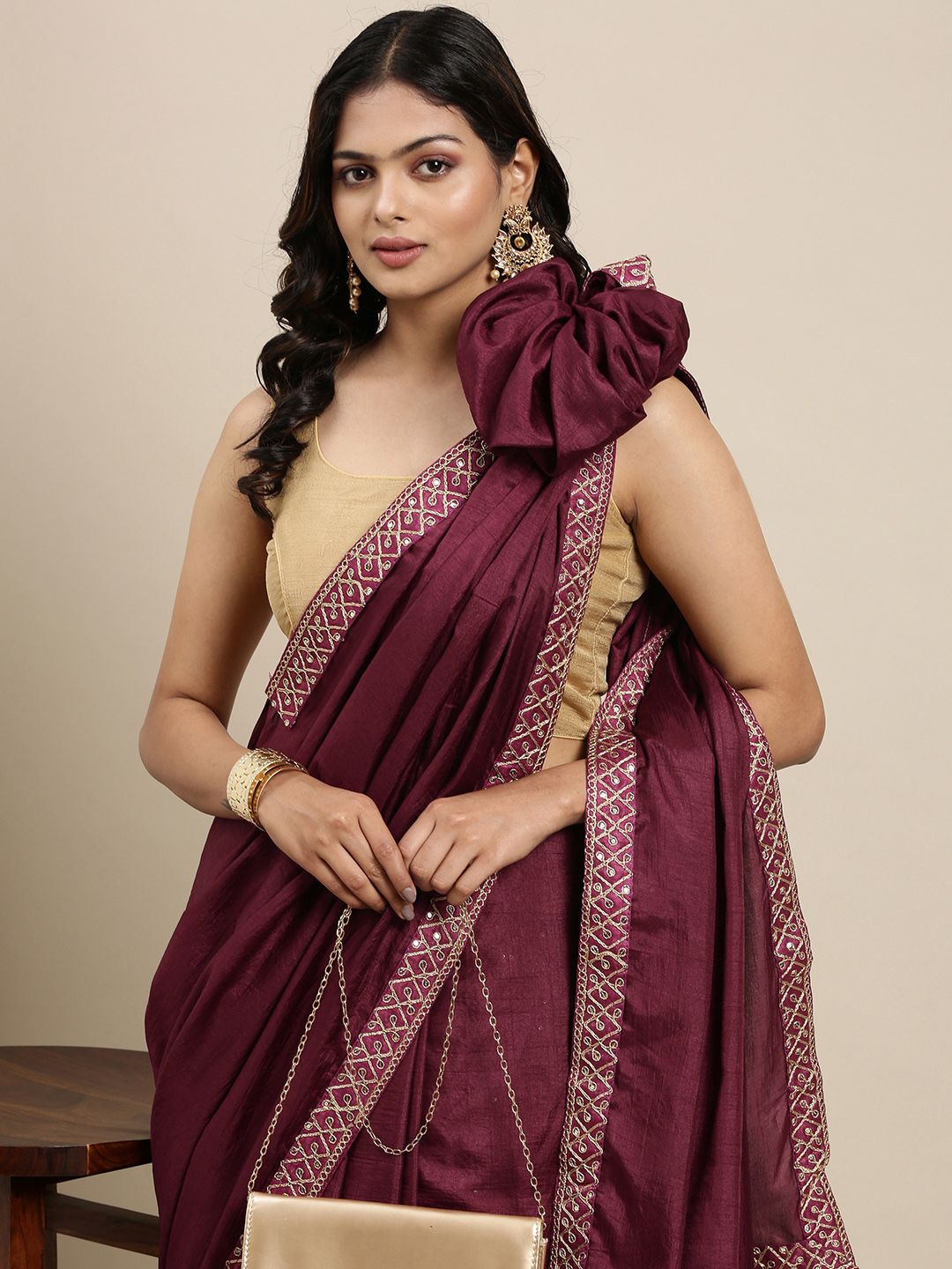 Mitera Burgundy Solid Saree wtih Embroidered Border Price in India