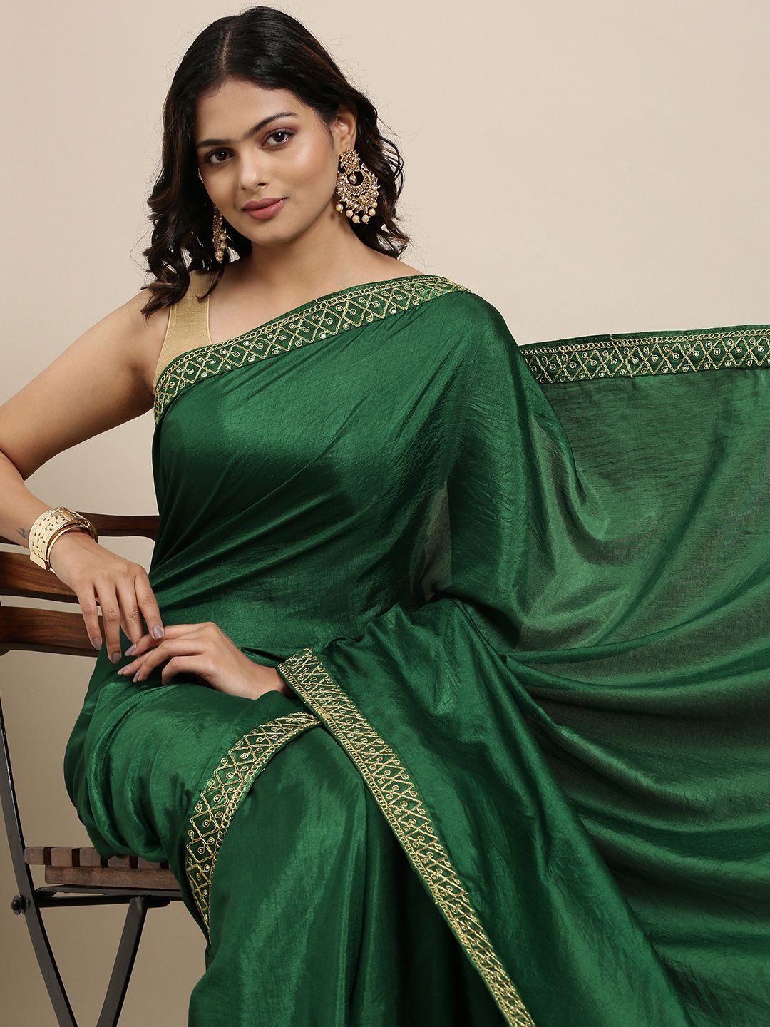 Mitera Green Solid Saree wtih Embroidered Border Price in India