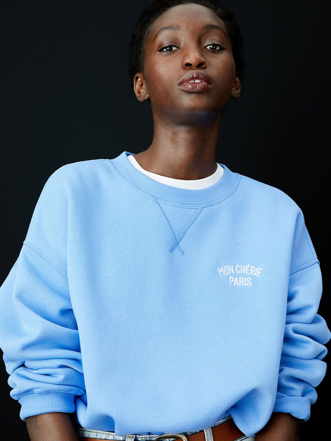 H&M Women Blue Solid Sweatshirt Price in India