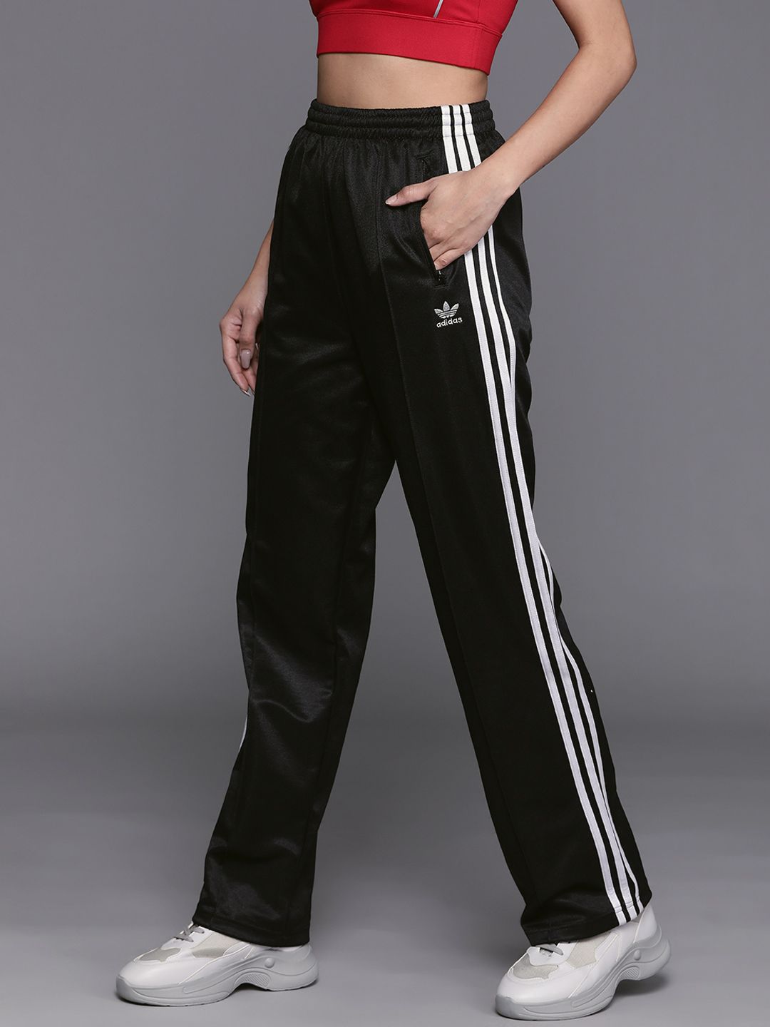 ADIDAS Originals Women Black Solid Flared Sustainable Track Pants Price in India
