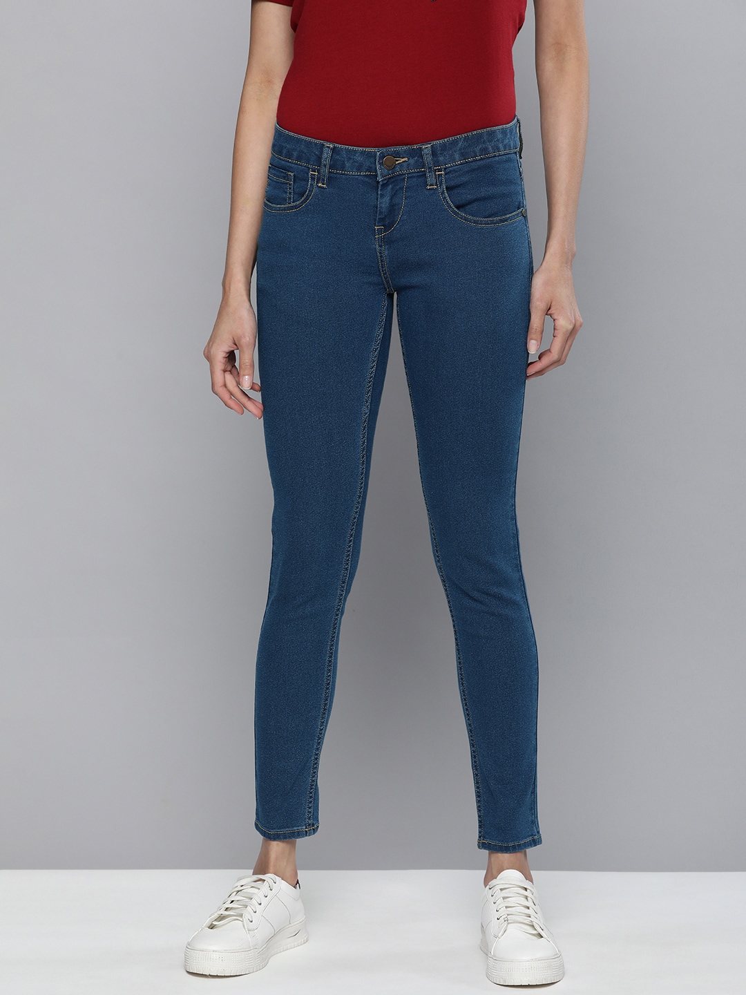 HERE&NOW Women Dark Indigo Blue Slim Fit Mid-Rise Clean Look Stretchable Jeans Price in India