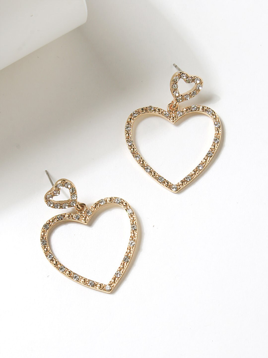 ToniQ Gold-Toned & Plated Heart Shaped CZ Studded Hoop Earrings Price in India