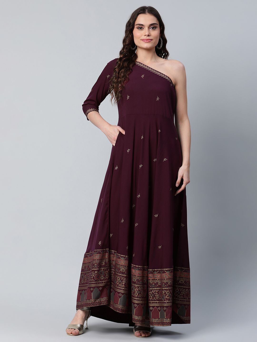 Ahalyaa Women Burgundy & Gold-Toned Ethnic Motifs One Shoulder Ethnic Maxi Dress Price in India