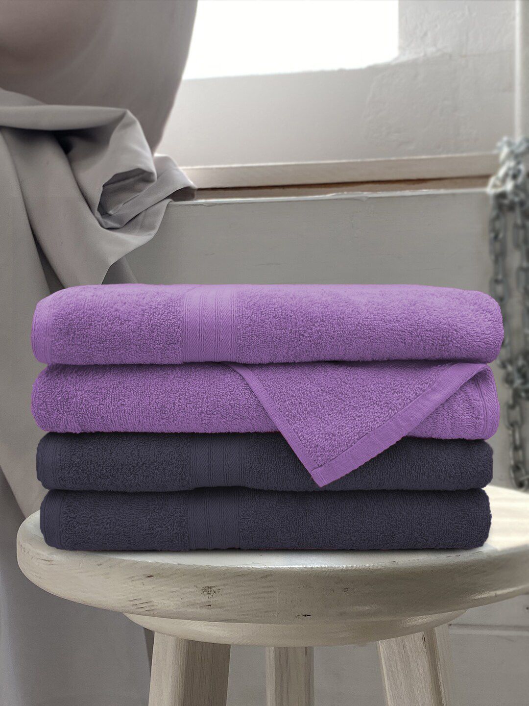 Aura Set Of 4 Solid 500 GSM Cotton Bath Towel Price in India