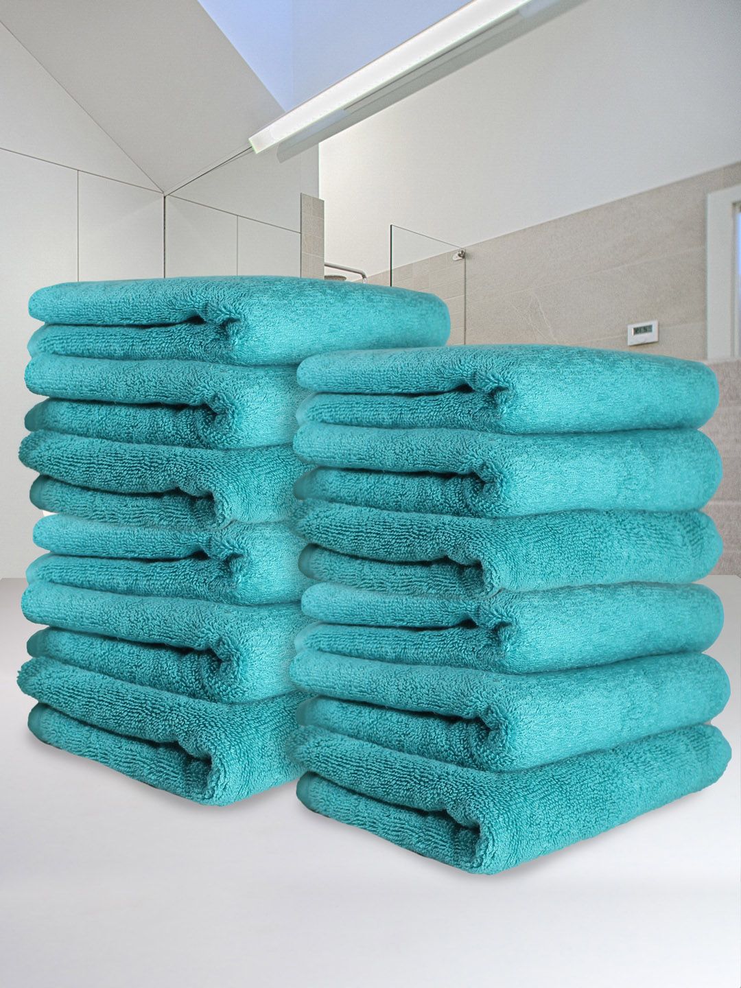 Heelium Pack Of 12 Teal Blue Solid 600 GSM Quick Absorbent Hand Towels Price in India