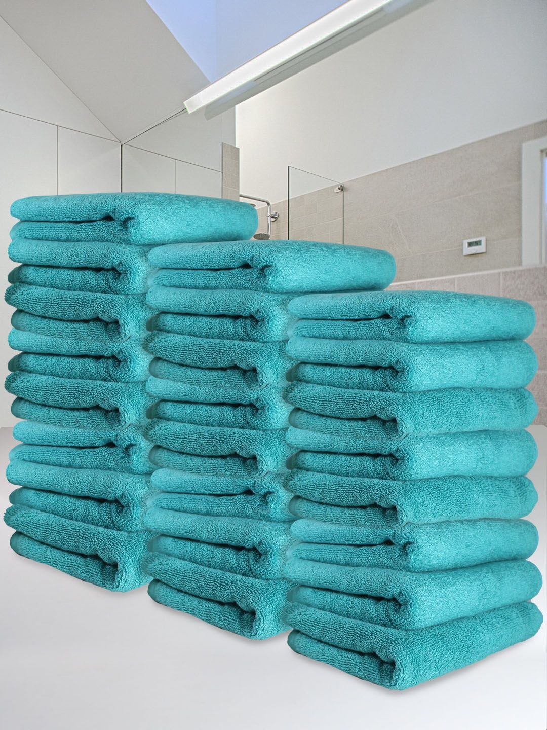 Heelium Pack Of 24 Teal Solid 600 GSM Quick Absorbent Hand Towels Price in India