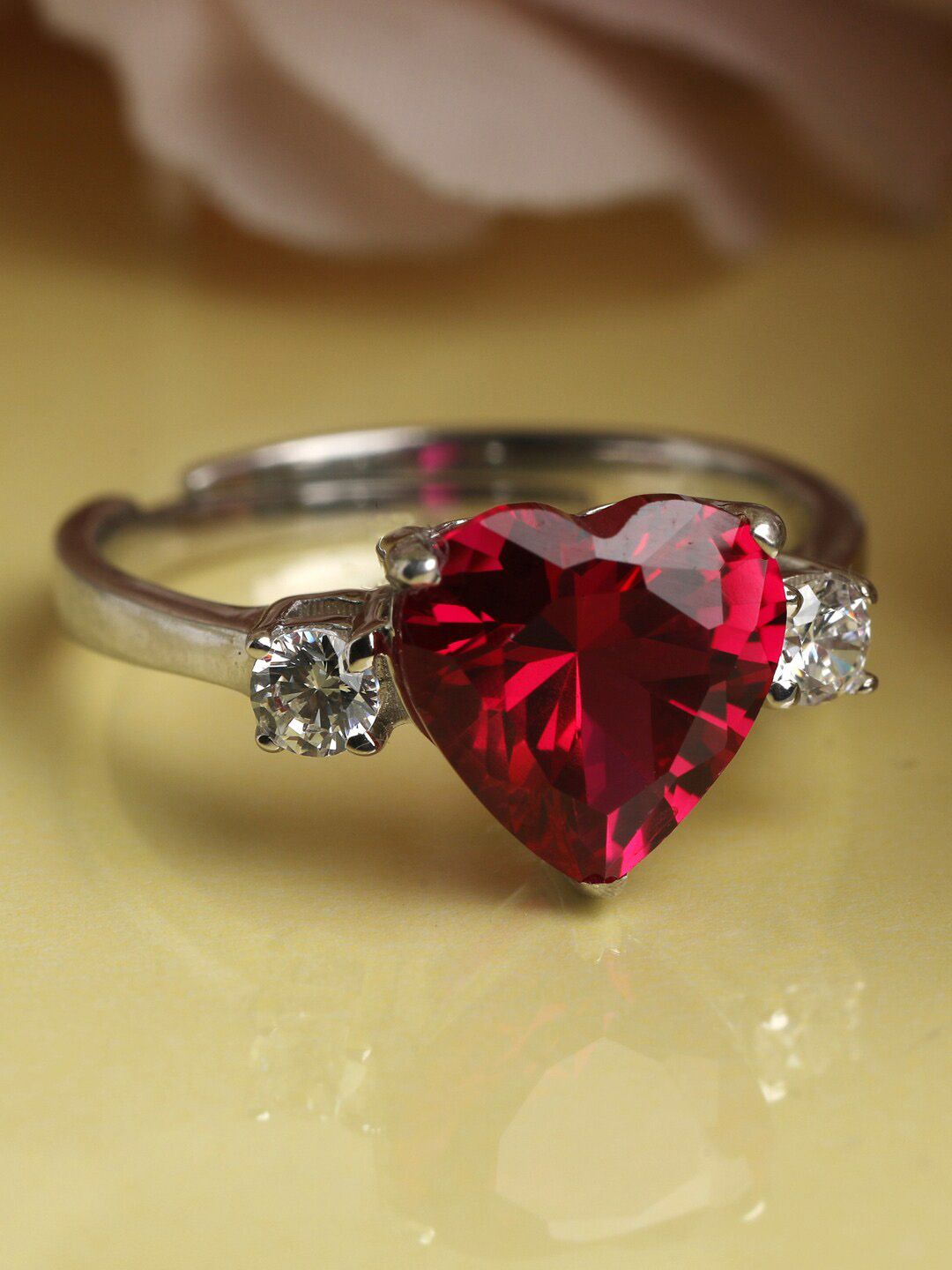 Clara Red & Silver-Toned Cubic Zirconia Studded Heart-Shaped Adjustable Finger Ring Price in India