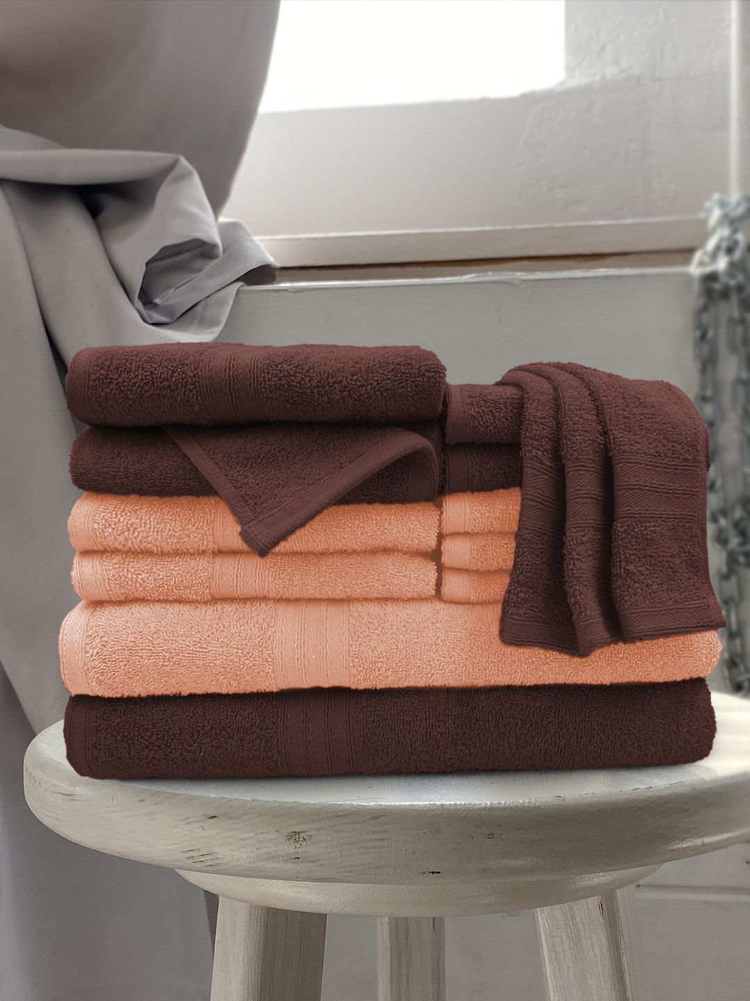 Aura Pack of 12 Brown & Peach-Coloured Solid 500 GSM Cotton Towels Price in India