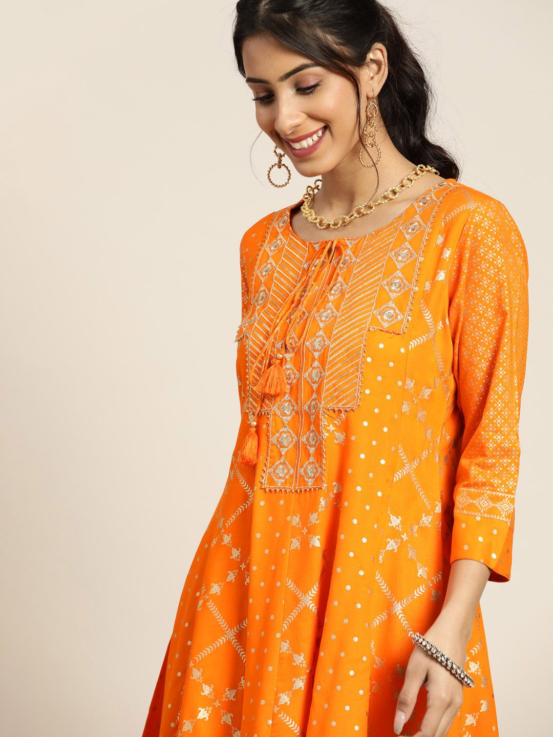 Sangria Women Orange & Golden Ethnic Motifs Printed Yoke Design Kurti with Dhoti Pants Price in India