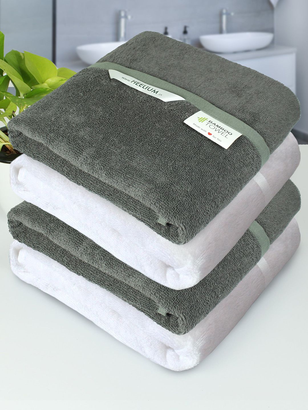 Heelium Set Of 4 Grey & White Solid 400 GSM Bath Towels Price in India