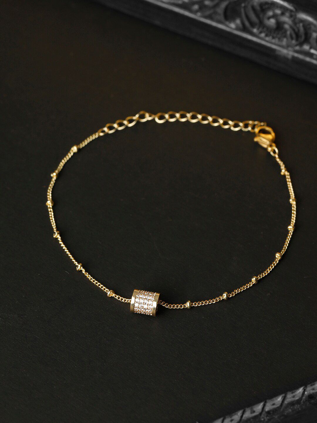 PRITA Women Gold-Toned & White Brass American Diamond Gold-Plated Link Bracelet Price in India