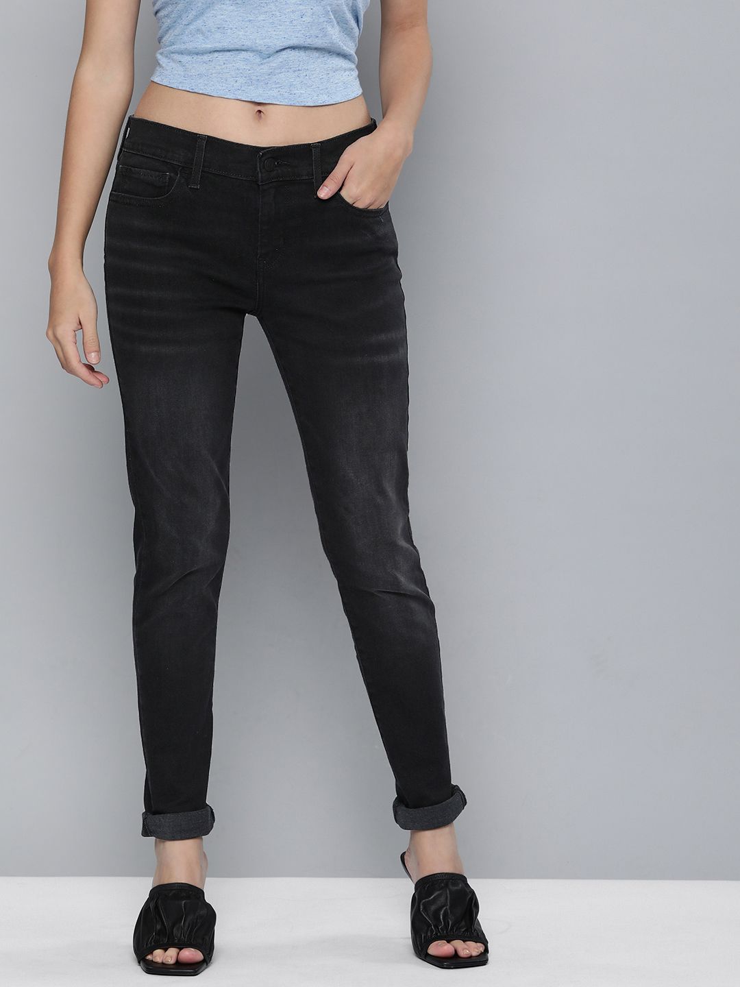Levis Women Black 710 Super Skinny Fit Mid Rise Light Fade Stretchable Jeans Price in India
