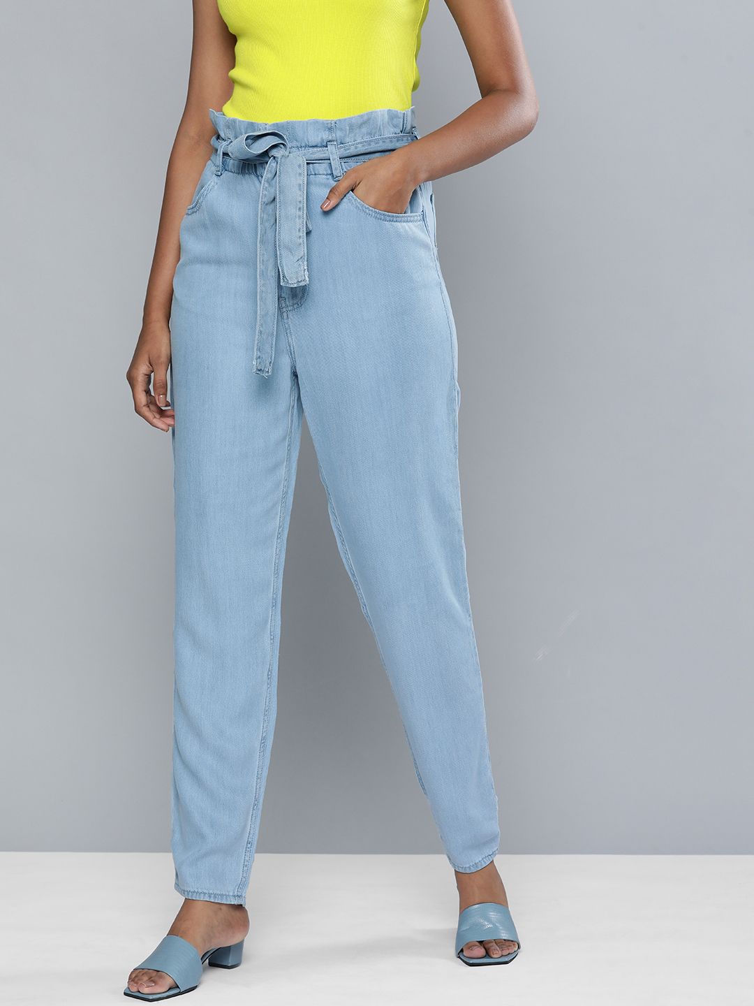 Levis X Deepika Padukone Women Light Blue Tapered Fit Mid-Rise Jeans With A Belt Price in India