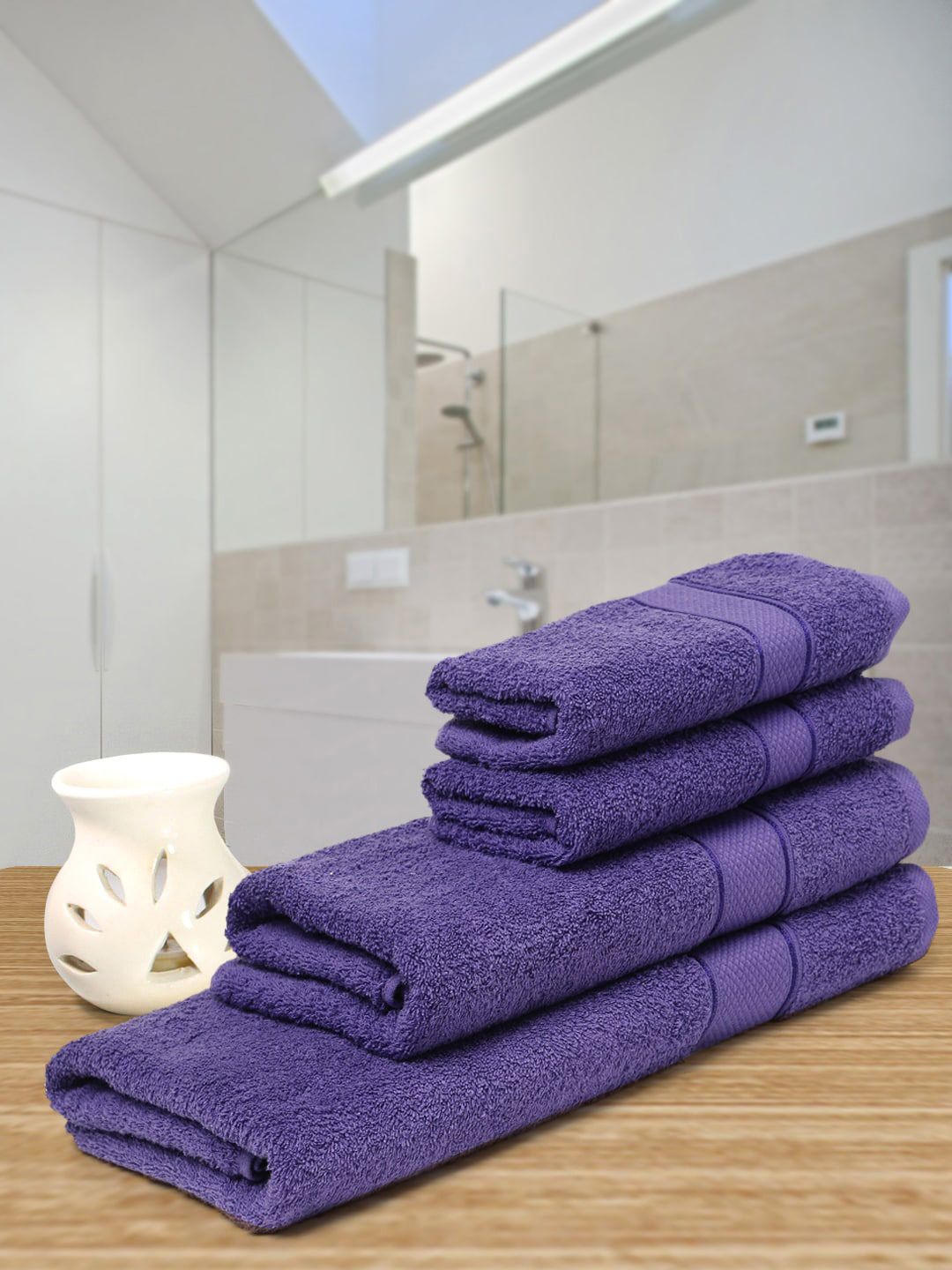 Creeva Set Of 4 Violet Solid 525 GSM Pure Cotton Towels Price in India
