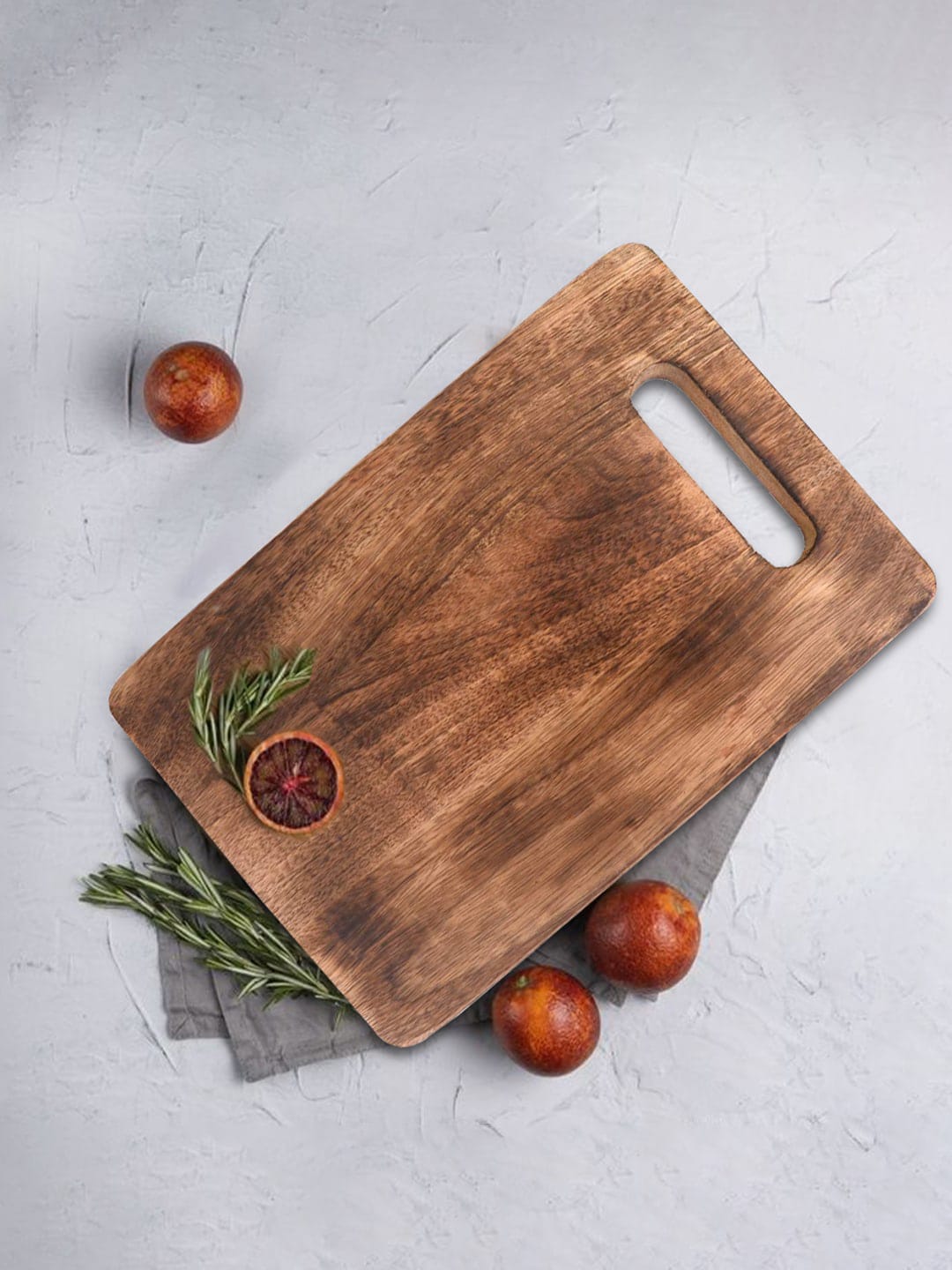 The Indus Valley Brown Wood Compact Mango Chopping Board with Wide Handle Price in India
