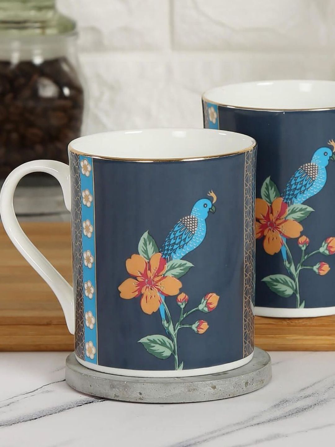 India Circus Blue & Yellow Floral Printed Set of 2 Ceramic Glossy Mugs Price in India