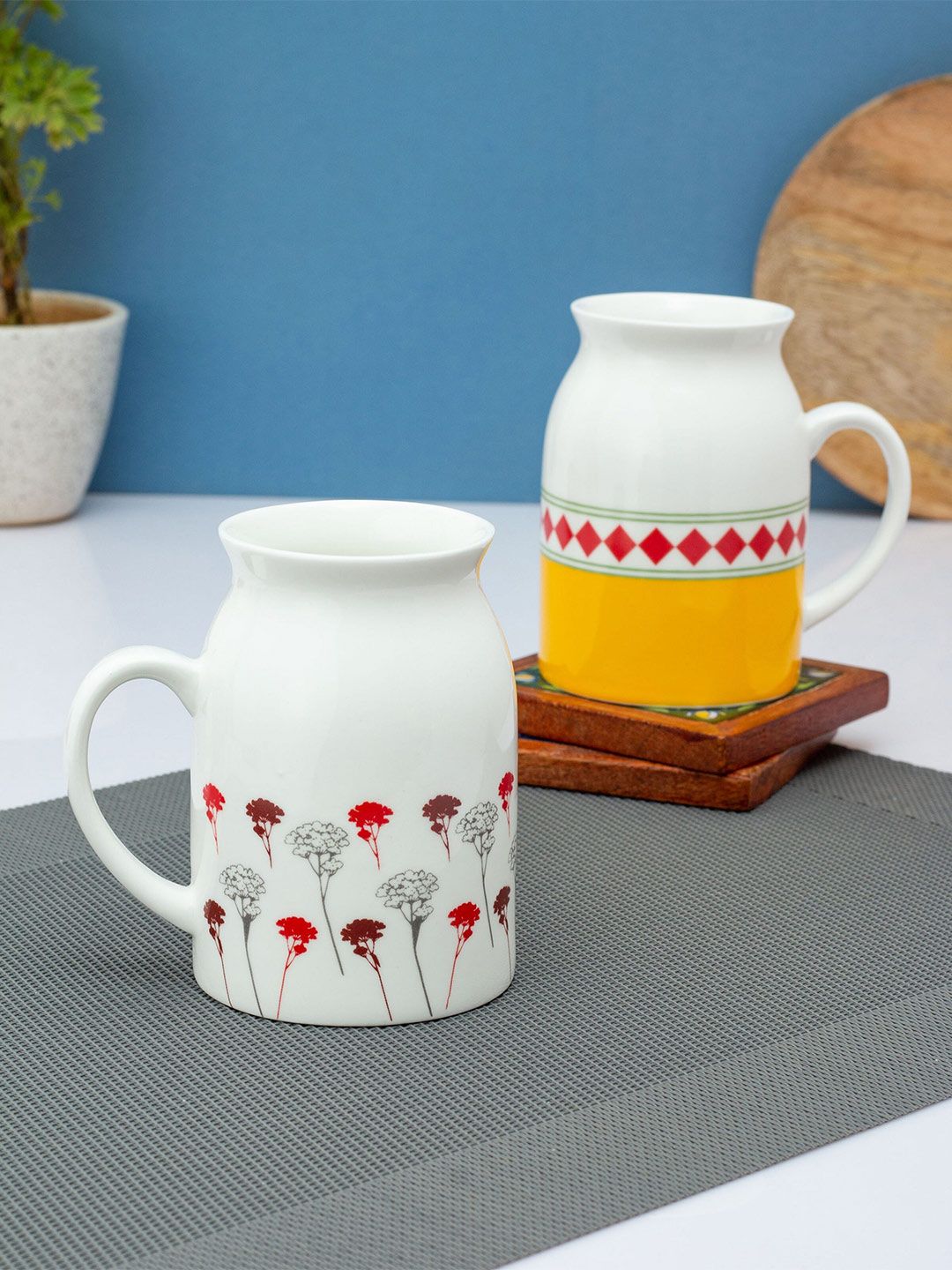 CLAY CRAFT Set-2 White & Yellow Printed Ceramic Glossy Cups and Mugs Price in India