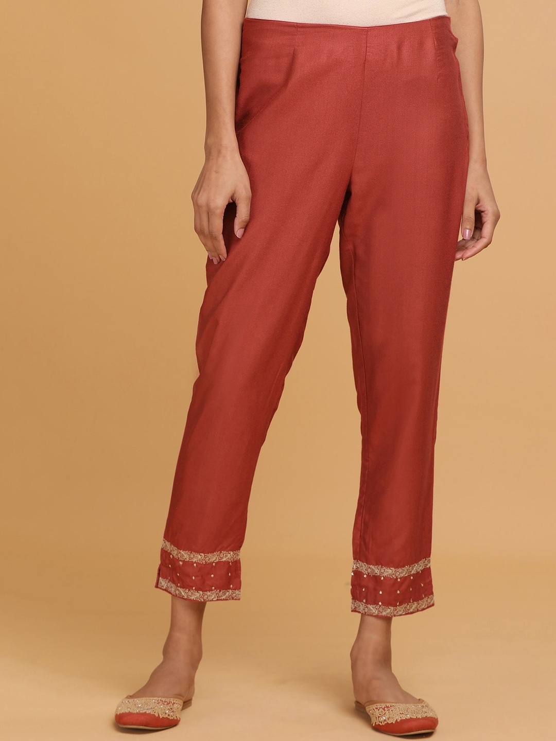 W The Folksong Collection - Women Rust Red Solid Slim Pants Price in India