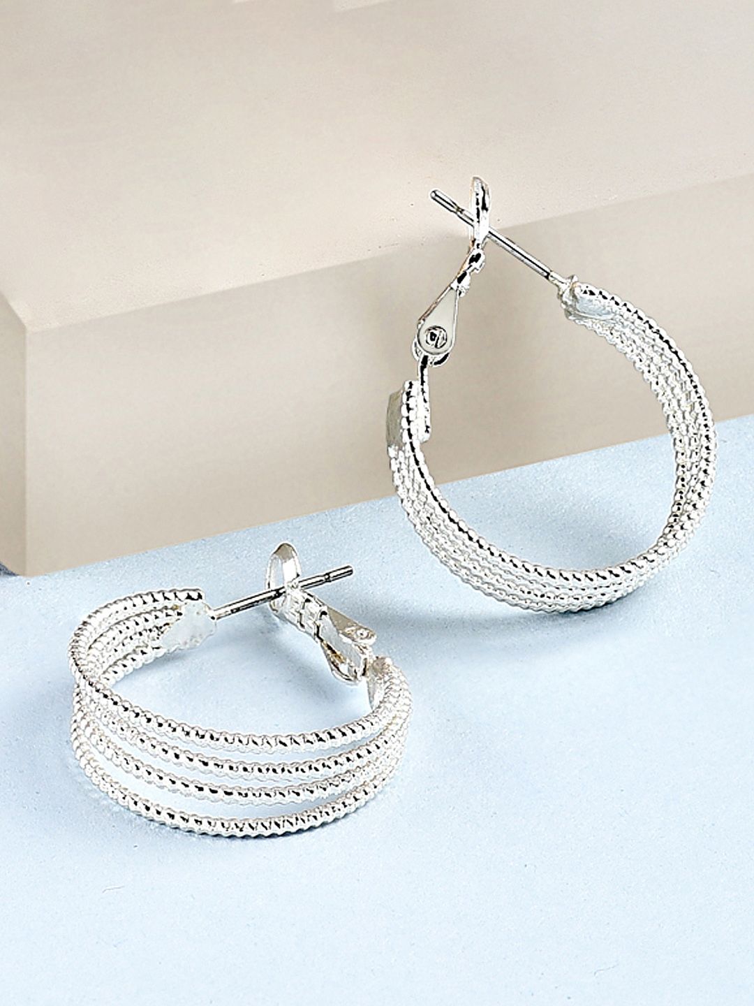 AMI Women Silver-Toned Contemporary Handcrafted Hoop Earrings Price in India