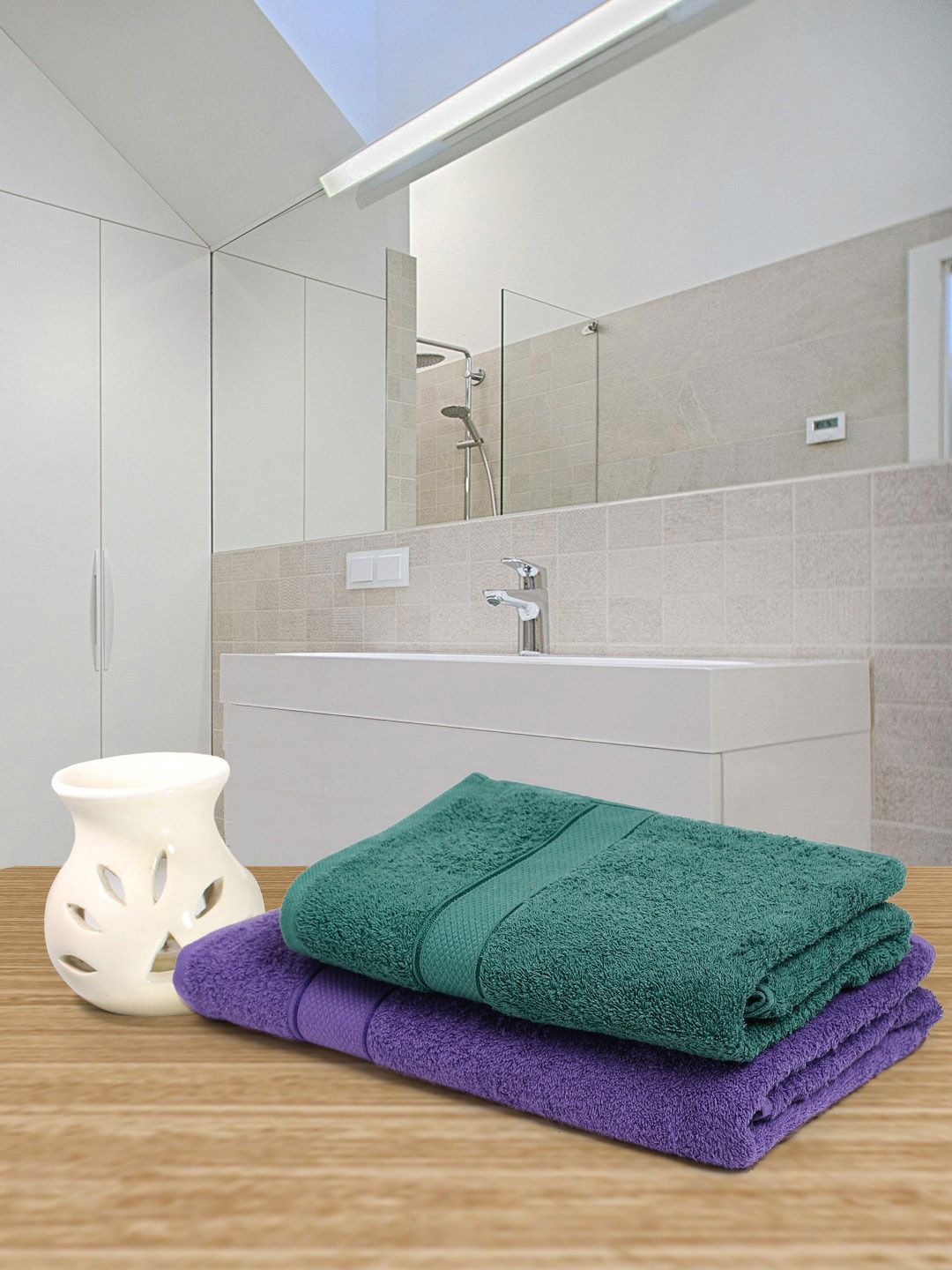 Creeva Pack of 2 Violet & Green Solid Couple 525 GSM Cotton Bath Towels Price in India
