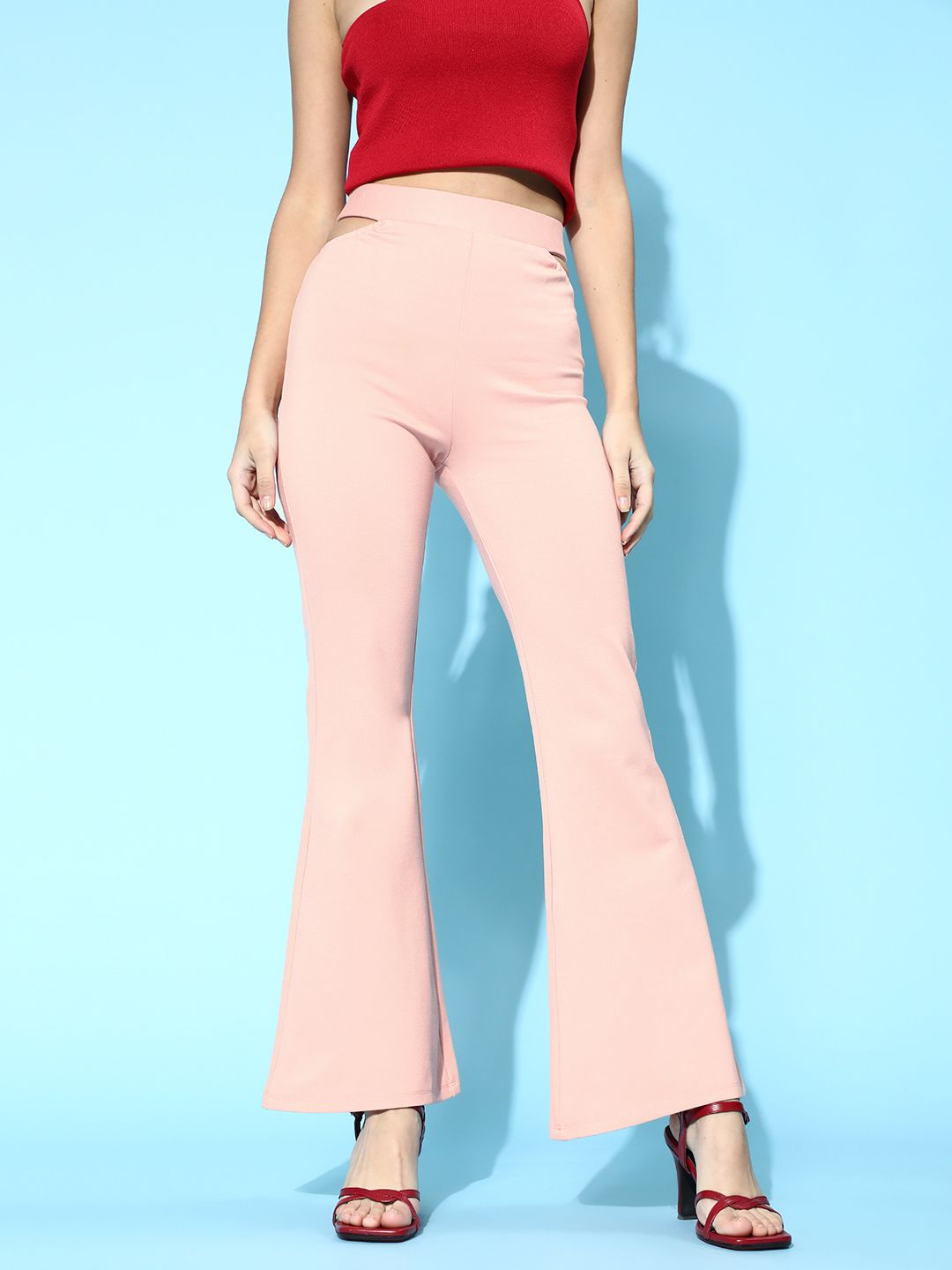 SASSAFRAS Women Pretty Pink Solid Kick Flare Trousers Price in India